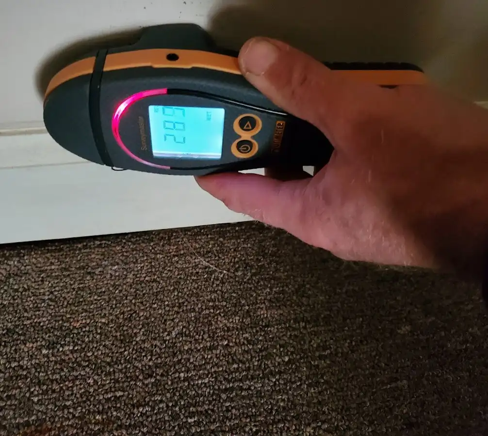 Moisture detection at baseboard during Sewage Cleanup & Sanitation in Seaside